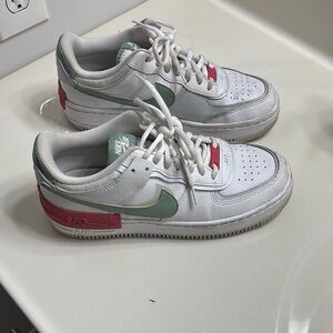 Nike Air Force 1 White Sneakers with Green and Red Accents